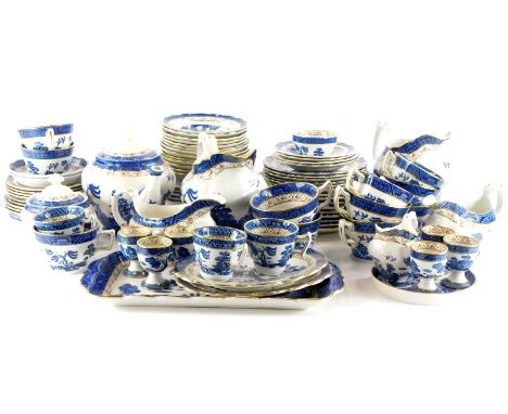 A Booths Real Old Willow pattern part dinner and tea service, to include various sizes of jugs, cups, egg cups, plates, etc.