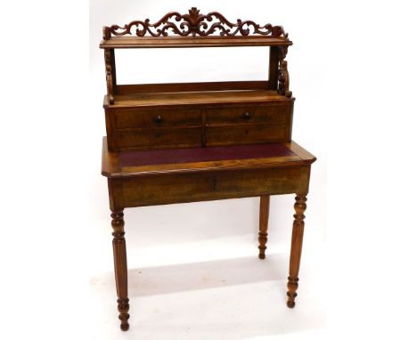 A 19thC French mahogany writing desk, the raised back with a pierced leaf carved gallery, above a shelf with a moulded edge o