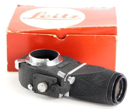 A Leitz Visoflex III with viewfinder, boxed.