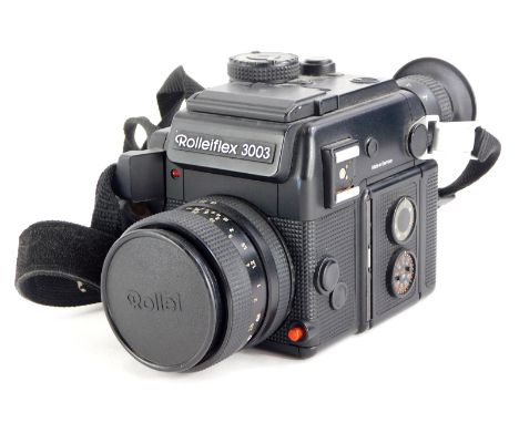 A Rolleiflex 3003 SLR camera, with Zeiss Planar f1.8 50mm lens. Upon initial inspection no apparent visible damage to camera 