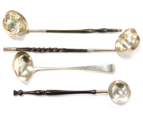 A Victorian Old English pattern Irish silver ladle, Dublin 1874, a silver and twisted whale bone handled ladle and two other 