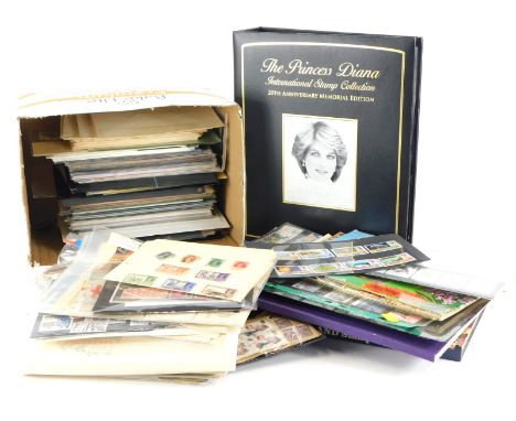 A large quantity of first day covers, some stamp albums, etc.