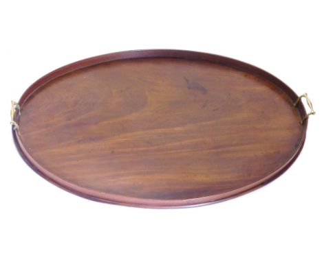 A large 19thC mahogany oval galleried tray, with two brass handles, 82cm wide.