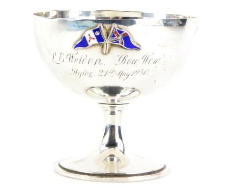 A George V silver goblet shaped trophy cup, applied with enamel flags, initialled L E Weldon, Bow Wow Hythe 24th May 1930, pr