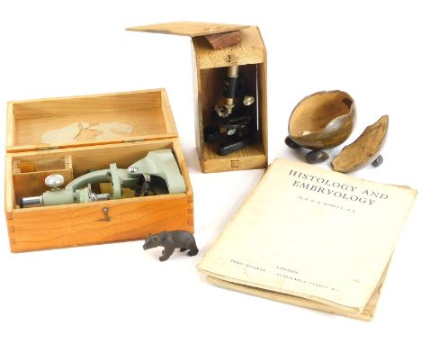 Miscellaneous items, to include a small microscope, a coconut box, Black Forest small bear, another microscope.