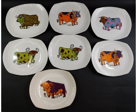 A set of seven Beefeater steak and grill plates, each with a vintage design of a coloured cow.