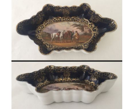 A 19th century Helena Wolfsohn trinket dish. Shows signs of restoration. Approx. 15.5cm long.
