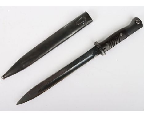 WW2 German K98  Bayonet: Black Bakelite  grip bayonet with stamping to blade and scabbard in good used condition 