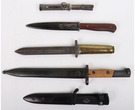 Belgium Fn49 Export Bayonet, with wooden grips and complete with scabbard. Arabic stampings to the reverse of the pommel. Chi