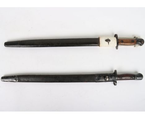 British 1907 Bayonets: Wilkinson made bayonet with Regimental stamp I.T.G. to top of hilt ,complete with scabbard and white w