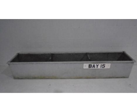 A large galvanised trough. 244cm x 49cm 
