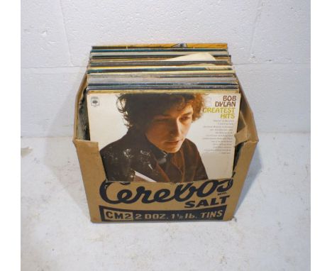 A quantity of 12" vinyl records including Bob Dylan, The Beatles, The Cars, John Lennon, Dire Straits, Bryan Adams, Paul Simo