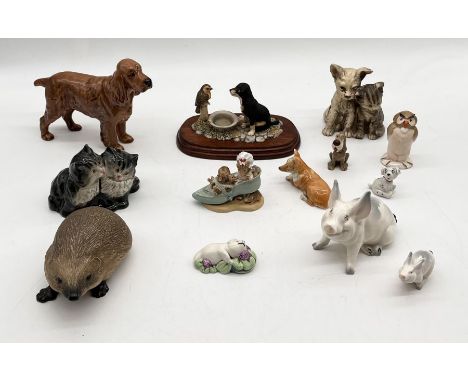 A collection of various ceramic animals including Beswick, Country Artists, Disney etc.