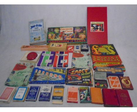 A collection of vintage games including chess, wooden building blocks, jigsaws, playing cards, Chinese checkers, dominoes etc