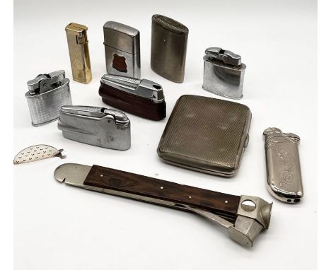 A collection of vintage lighters, cigar cutter, vesta etc.