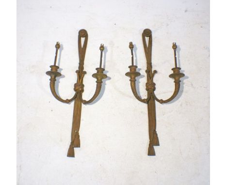 A pair of antique classical style wall lights in the form of tie-backs, height 69cm.