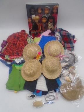 A collection of Sasha dolls clothing and accessories including dresses, jumpers, hats, shoes, hair etc, along with a Sasha Do