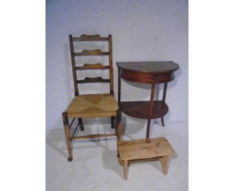 A vintage demi-lune table plus a ladder-back chair and a stool., 