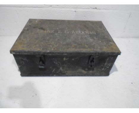 A metal storage trunk named to the top "Frank L G Akerman" - width 53cm