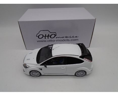 A boxed Otto Mobile die-cast car model of a Ford Focus RS MK2 in white (Scale 1;18)