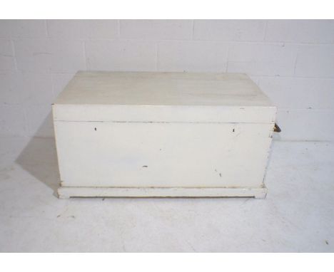 A white painted pine trunk, length 107cm, depth 60cm, height 52cm.