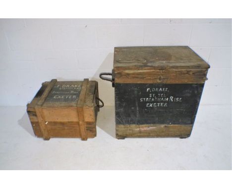 A large wooden trunk along with another smaller.