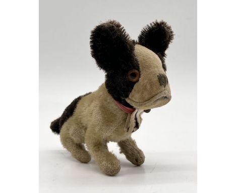 A German early 20th century mohair and velvet seated Bully dog with glass eyes and stitched nose - possibly Steiff but no but