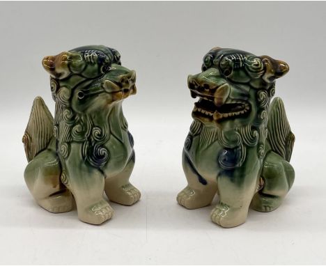 A pair of modern ceramic Foo dogs 