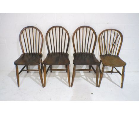 A set of three Ercol Windsor stick-back chairs along with another similar 