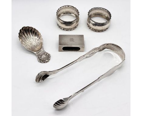 A collection of hallmarked silver including caddy spoon, sugar nips, matchbox holder etc.