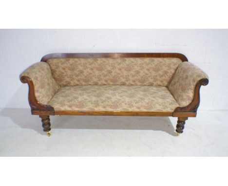 A William IV sofa raised on turned legs, length 198cm.