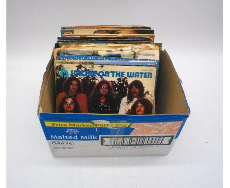 A quantity of 7" vinyl records including Deep Purple, Uriah Heep, Hawkwind, Thin Lizzy, The Rolling Stones, The Monkees, Budg