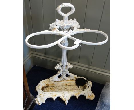 A VICTORIAN CAST IRON STICK STAND with registration mark, painted white