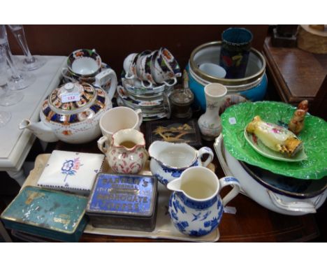 A VINTAGE "DAYLIGHT" BICYCLE LAMP, a lacquered cigarette box, a Poole Pottery box and sundries