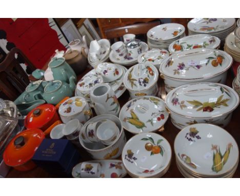 A COLLECTION OF ROYAL WORCESTER EVESHAM DINNERWARE, including numerous tureens, other ceramics, two Le Crueset saucepans and 