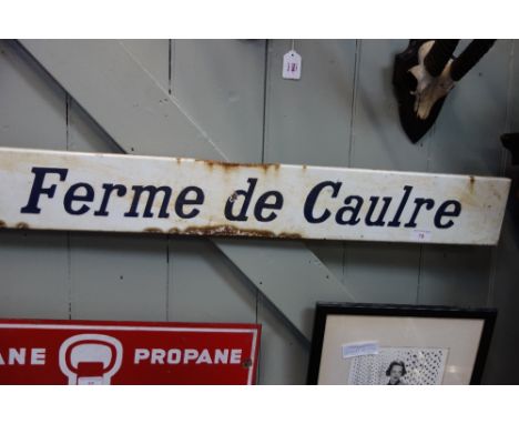 A VINTAGE FRENCH ENAMEL ROAD SIGN "FERME DE CAULRE"