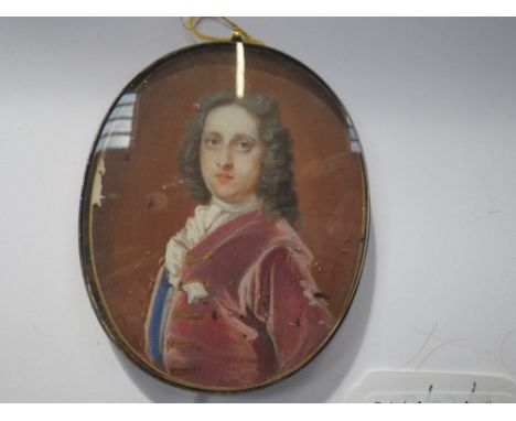 ENGLISH SCHOOL, 18TH CENTURY Portrait of a gentleman wearing a maroon velvet jacket, watercolour, oval, 8cm x 6.5cm