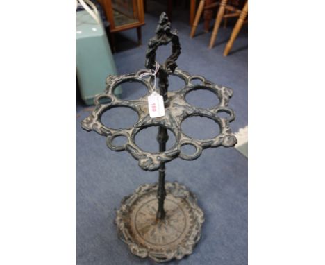 A VICTORIAN CAST IRON UMBRELLA AND STICK STAND