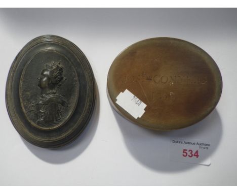 AN 18TH CENTURY OVA HORN BOX, with a portrait of a Queen (Anne?) inscribed, "JOS: H * CONYERS 1758" 10.5cm long