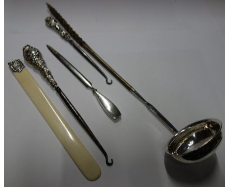 A TODDY LADLE with bone handle, a silver handled button hook and similar items