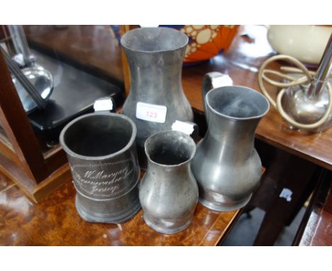THREE BALUSTER SHAPED JERSEY PEWTER MEASURES, graduated and a mug engraved "W Morgan Perseverance in Jersey" (4)