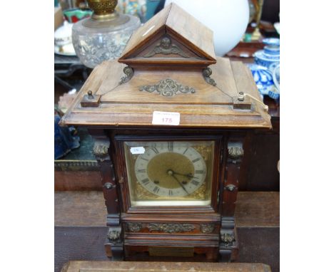 A LATE VICTORIAN WALNUT CASED BRACKET CLOCK with presentation plaque dated 1899