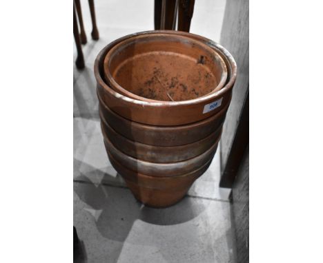 A selection of terracotta garden plant pots some marked made in Italy, mosty 24cm diameter, used but good condition