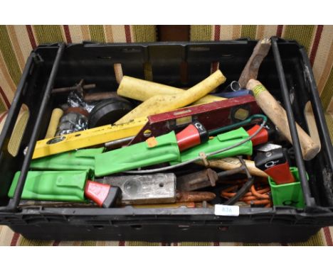 A selection of gardening and building tools including Stabila level