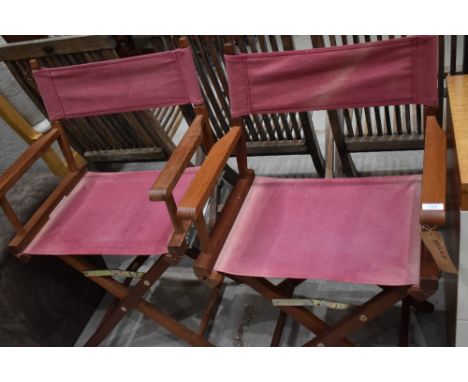 Two collapsible directors style garden chairs in iroko wood