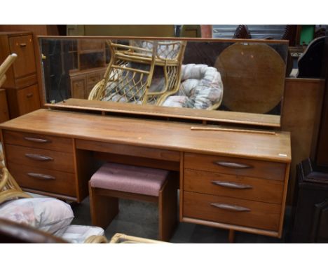 A vintage G plan or similar dressing table with stool, width approx. 170cm
Condition Report - Marks and stains on top and fro