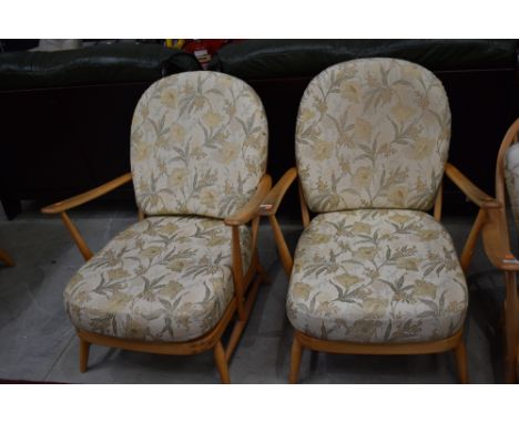 A pair of light Ercol cottage style armchairs