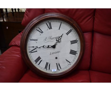 A large sized wooden cased Panama Newgate clock