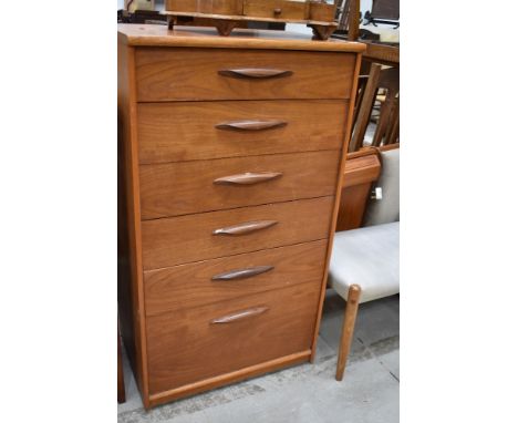 A vintage G plan or similar six drawer chest having extra deep bottom drawer, dimensions approx. W64 D43 H115cm
Condition Rep