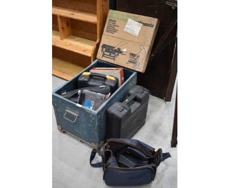 A selection of tools and garage accessories including 8 track radio